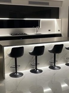 Black and white kitchen with island seating